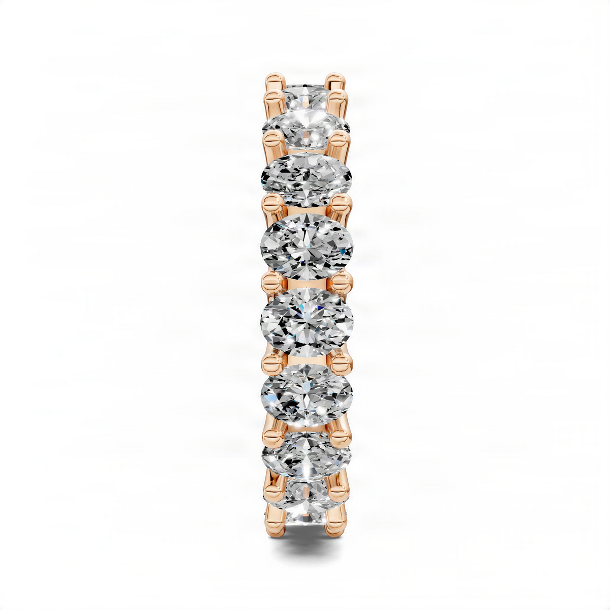 Gold-tone oval eternity ring with stacked oval clear gemstones in prong settings
