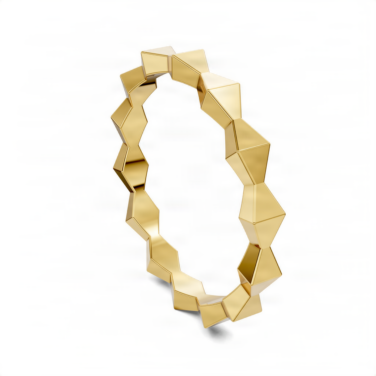 Geometric sculpture ring with polished facets, yellow-gold tone, angled view.