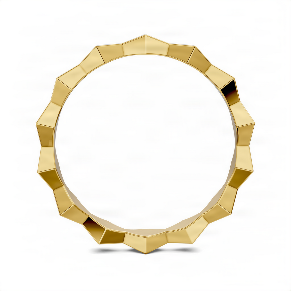 Geometric sculpture-style ring with polished facets, yellow-gold tone, front view.