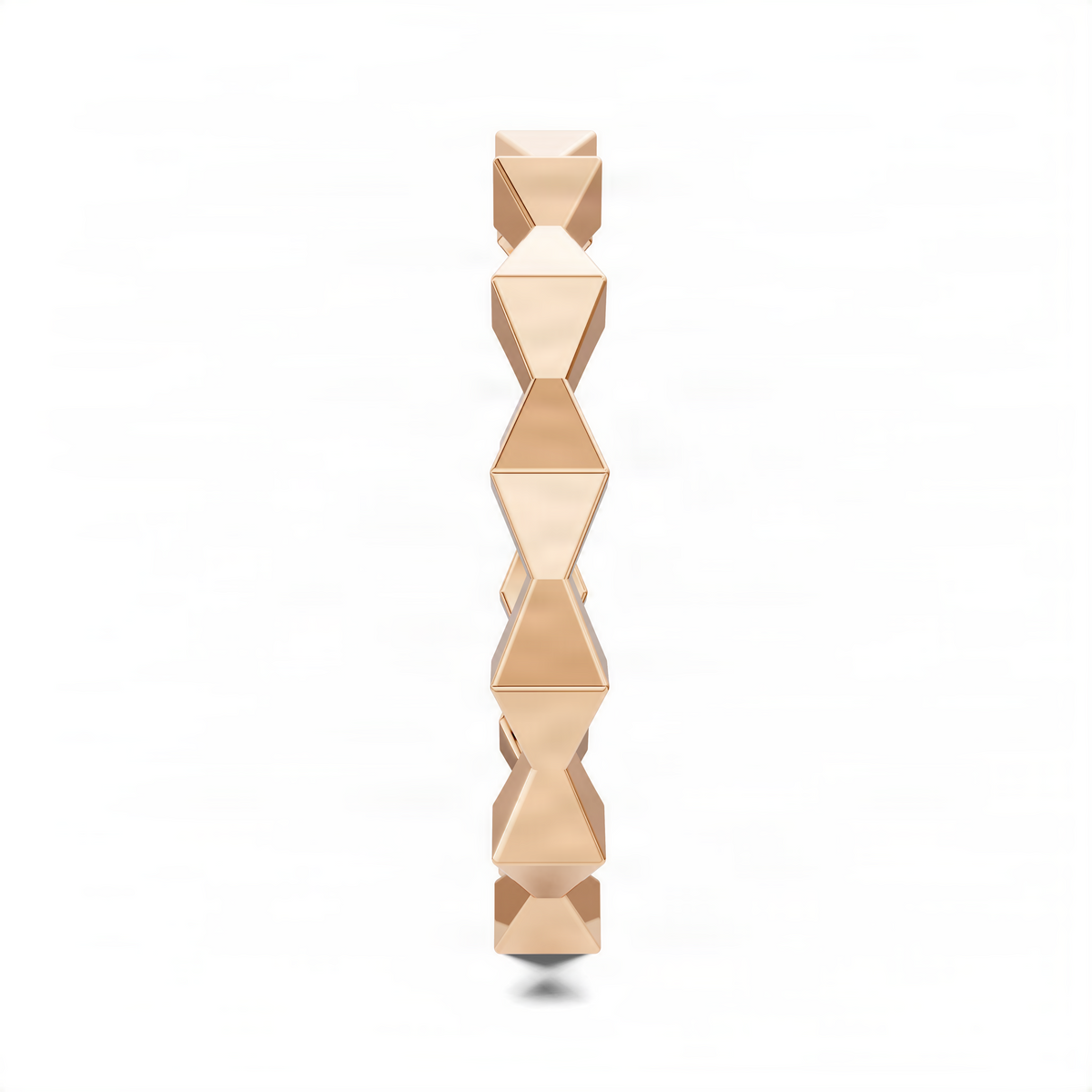 Geometric sculpture-style ring with polished facets, rose-gold tone, vertical view.