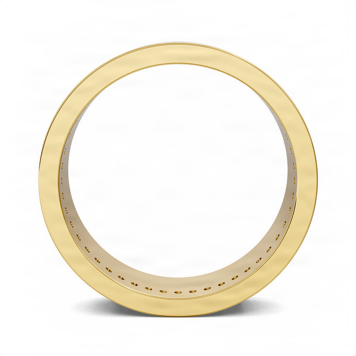 Yellow gold eternity band ring with dot markings on the inner band