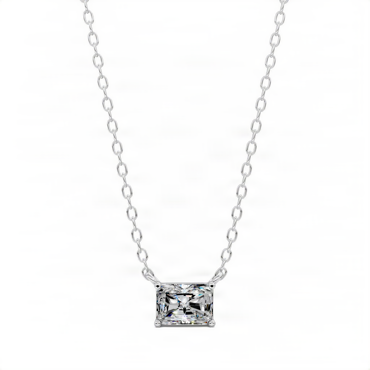 White gold solitaire pendant with square radiant-cut clear stone on link chain