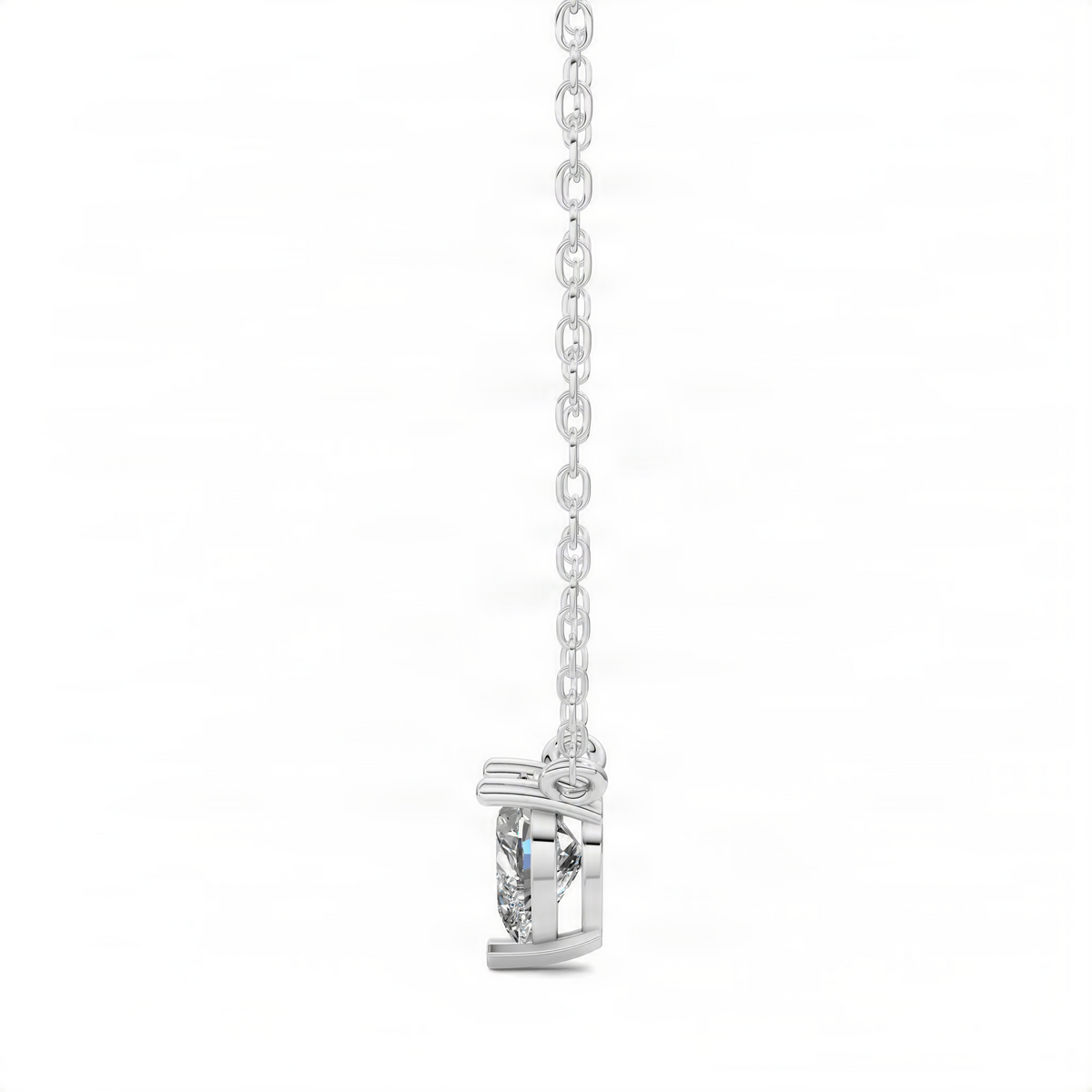 White gold heart diamond pendant with heart-shaped stone, side view on link chain
