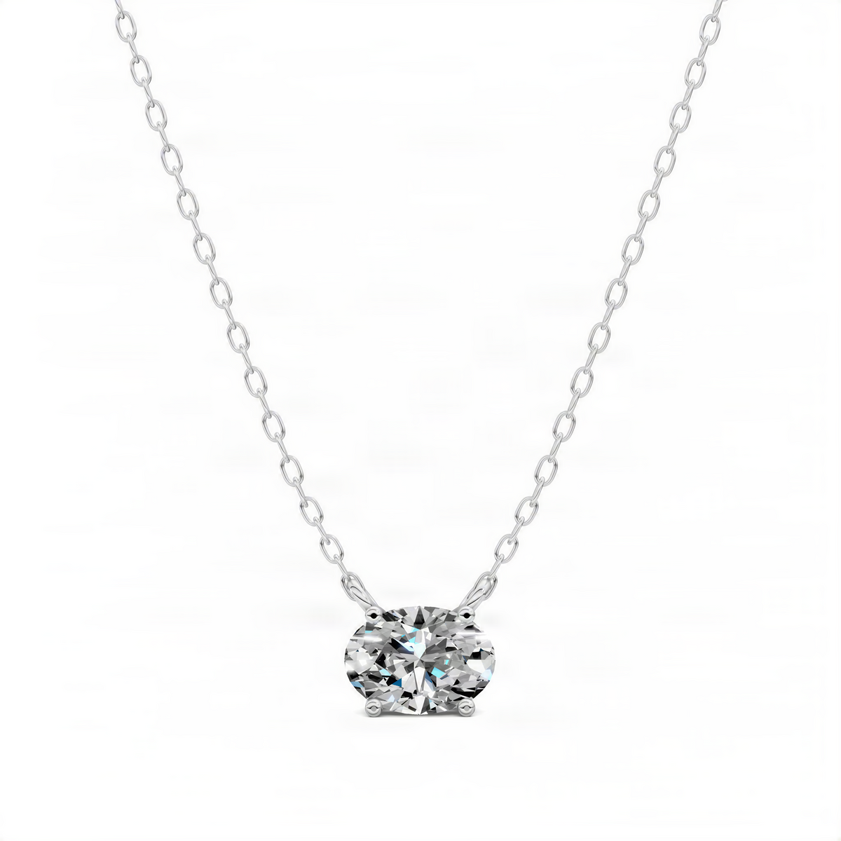 Oval solitaire diamond pendant on silver-toned chain