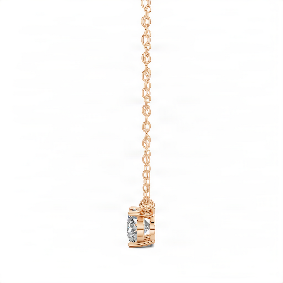 Oval solitaire diamond pendant on rose gold-toned chain