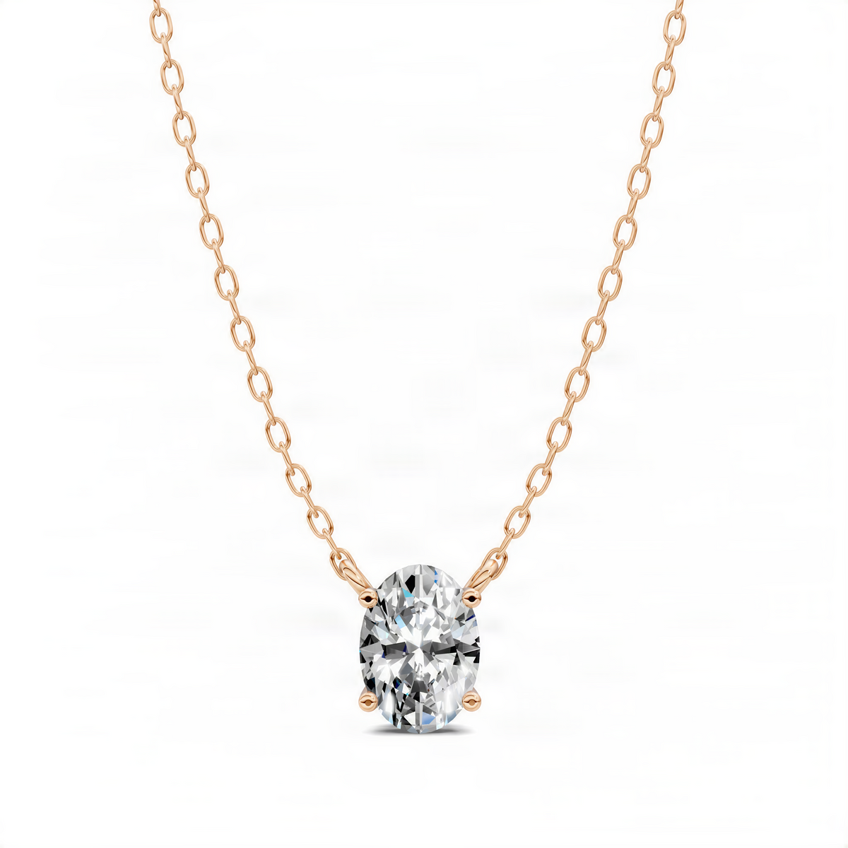 Rose-gold chain with oval diamond pendant, four-prong cushion-style center stone