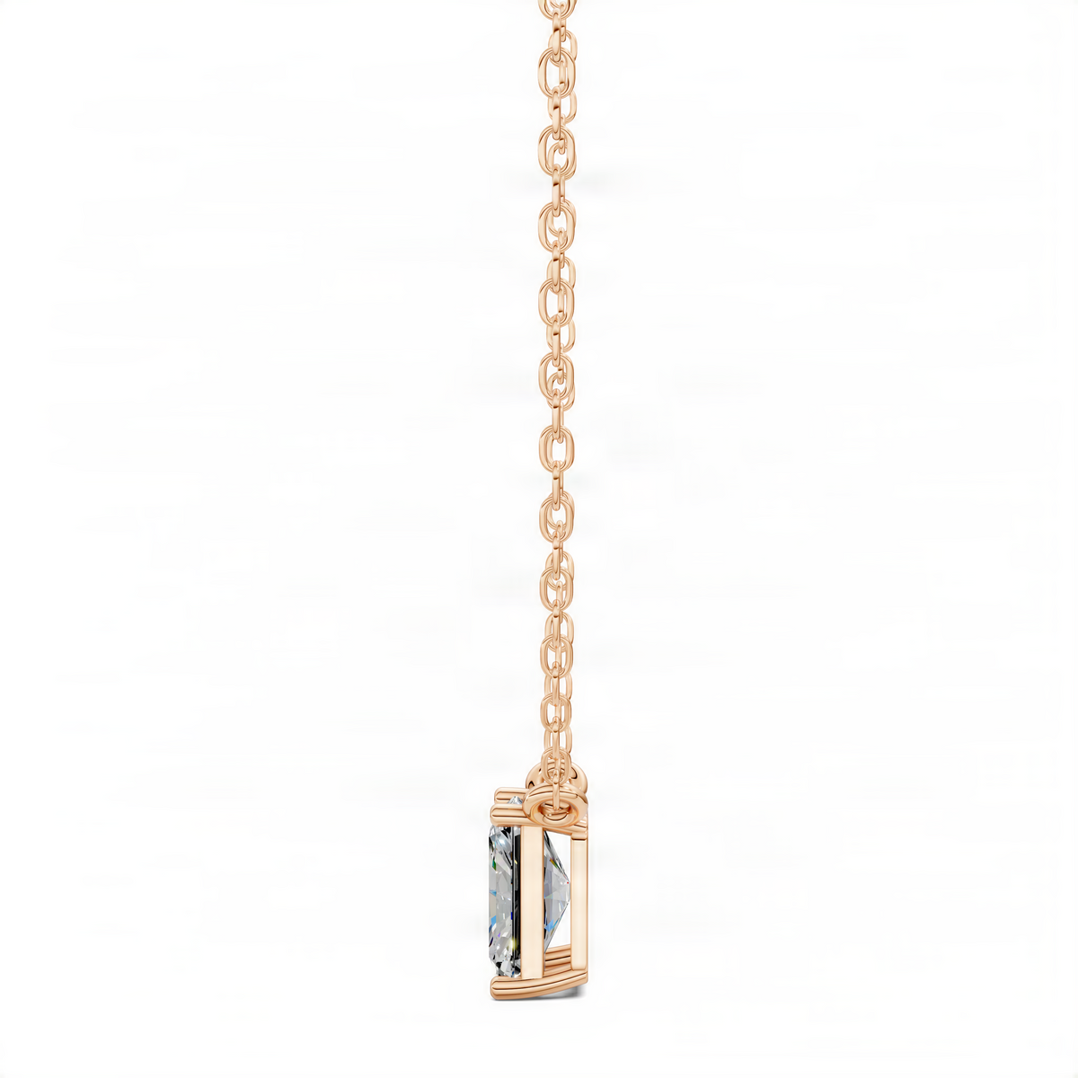 Radiant-cut square diamond pendant side view on rose gold-tone chain, prong-set
