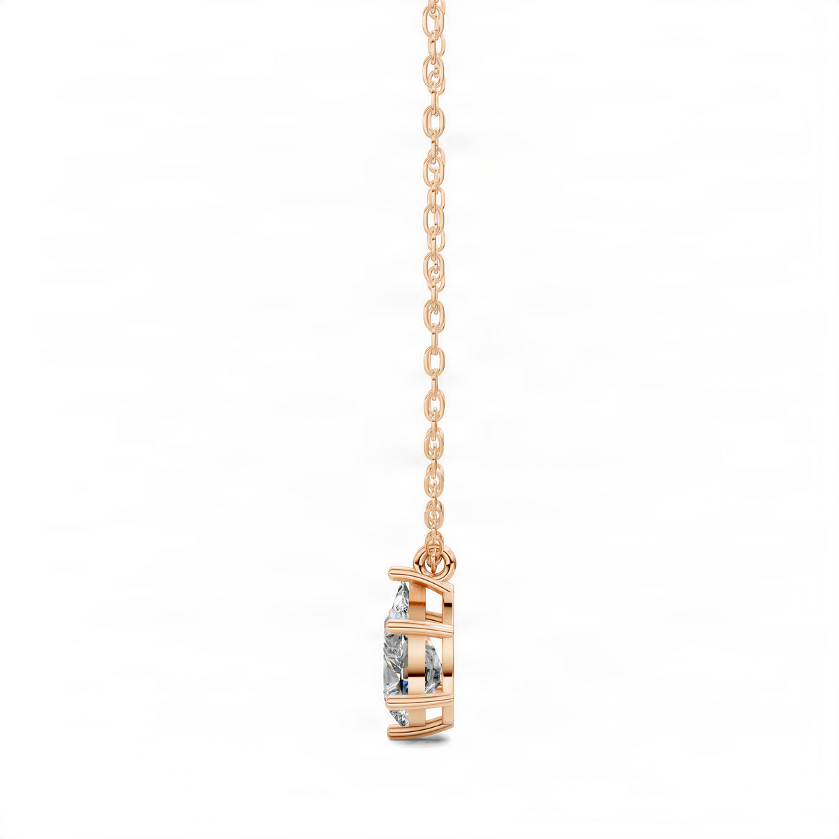 Pear diamond pendant on rose gold chain, side view