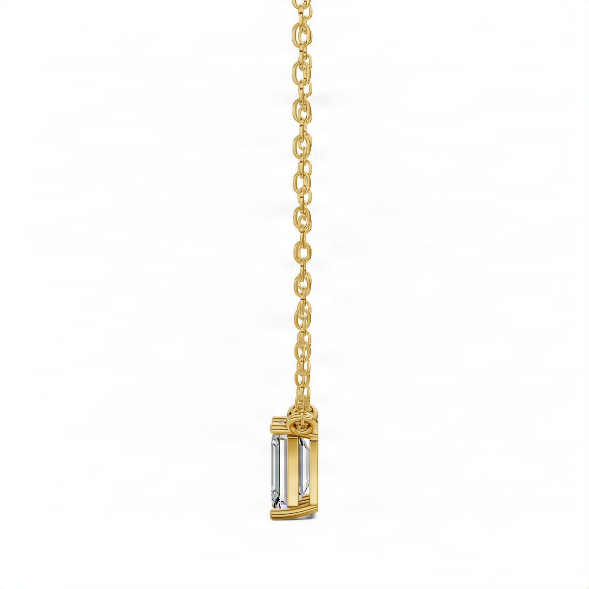 Yellow gold diamond pendant on chain with emerald-cut center stone in a bezel setting