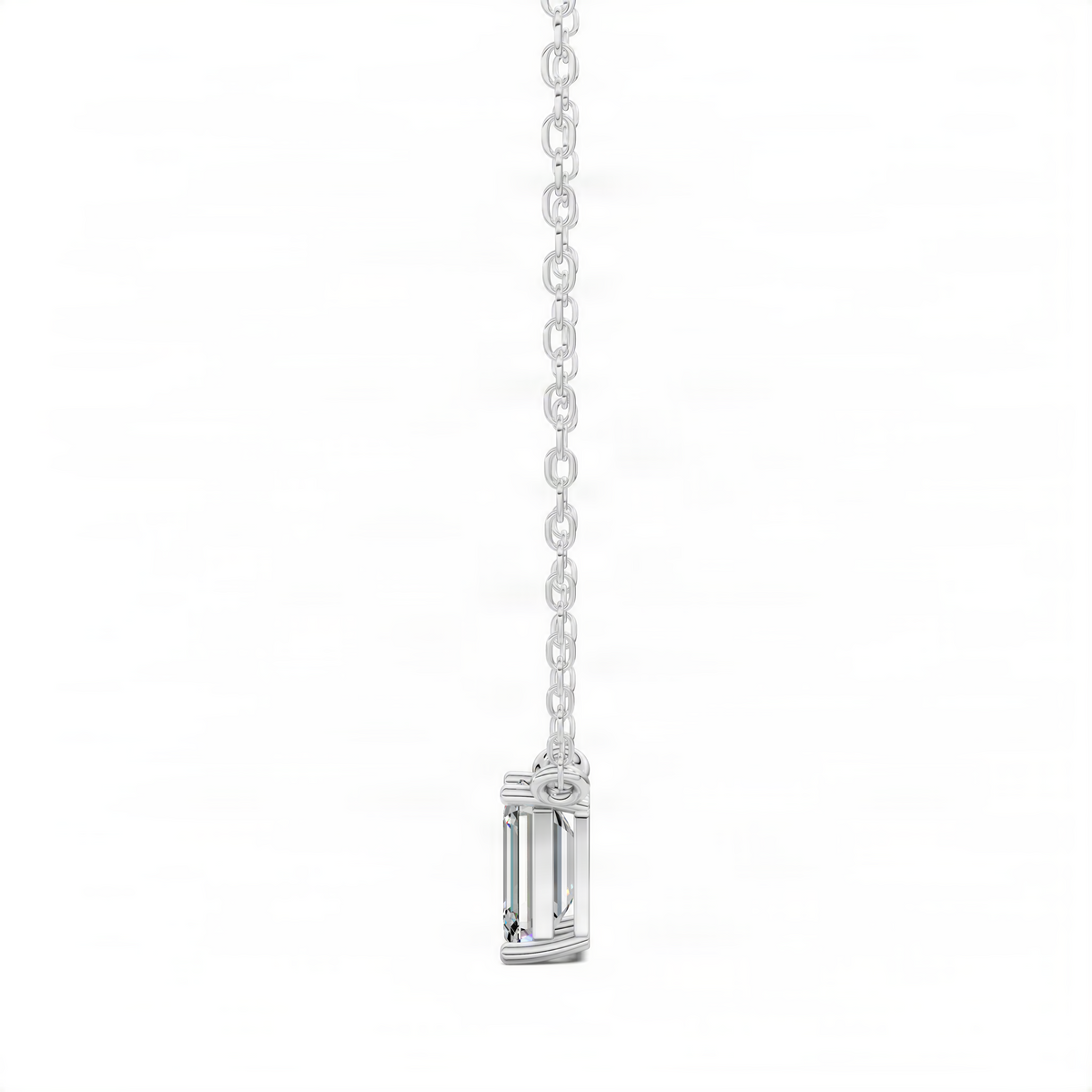 White gold diamond pendant on chain with emerald-cut center stone in a bezel setting