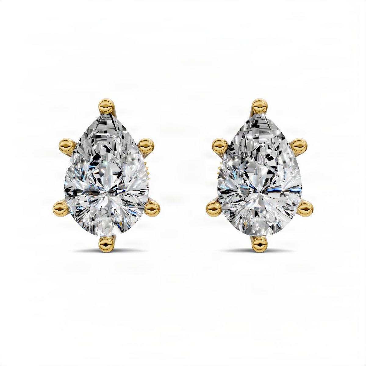 Yellow gold pear-cut diamond basket stud earrings, teardrop stones with rounded gold prongs