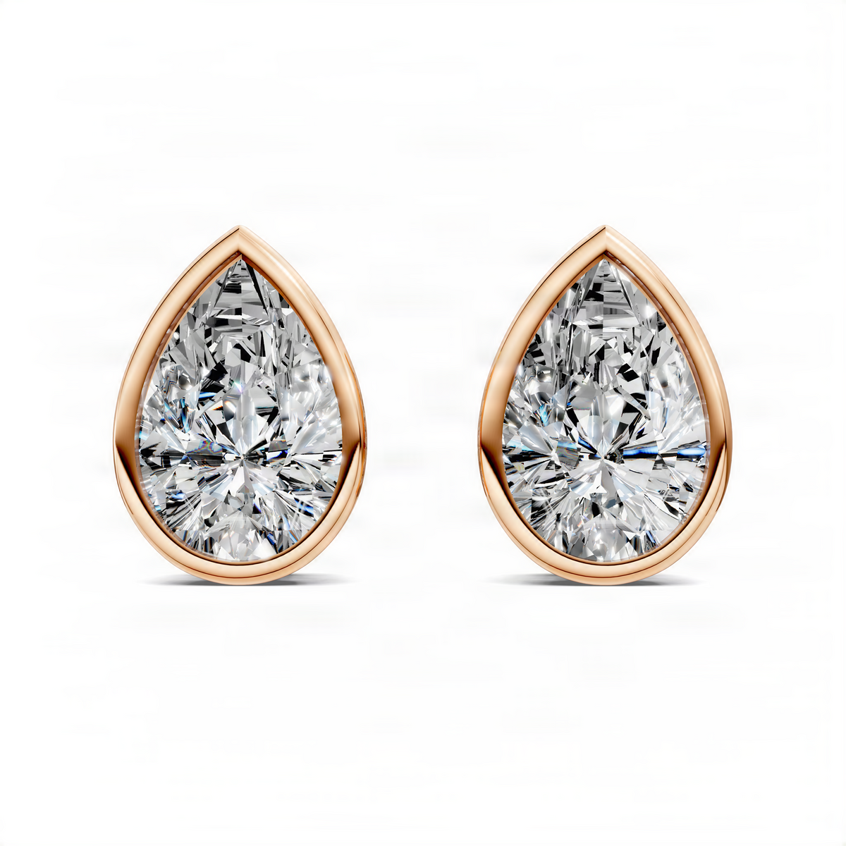 Pear-cut bezel stud earrings in rose gold with a clear pear diamond, front pair