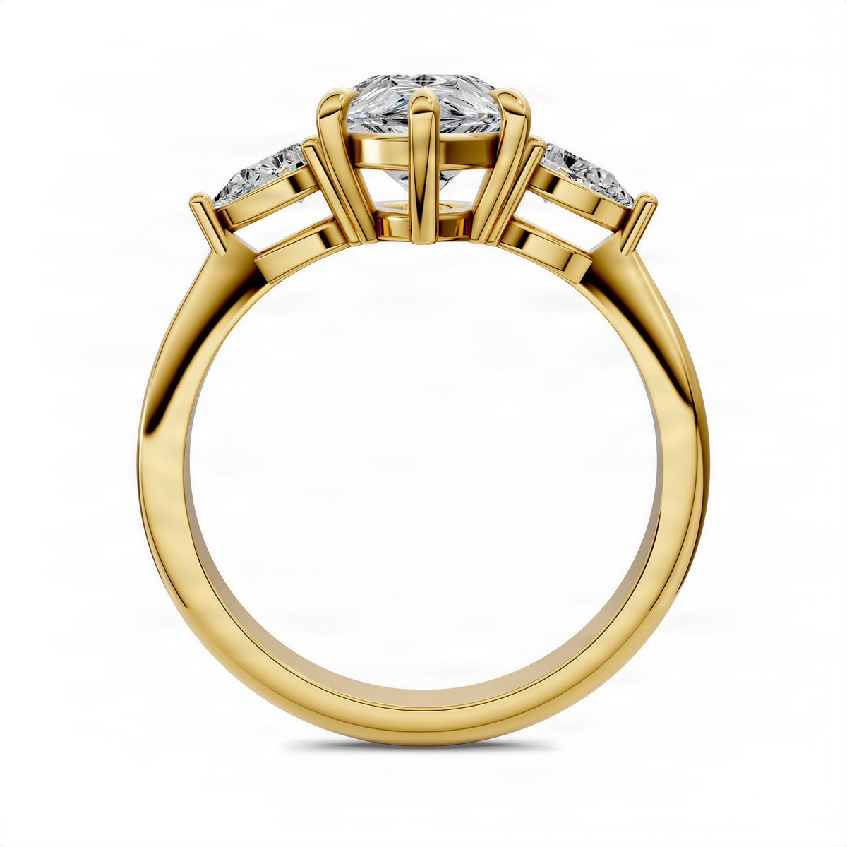 Yellow gold three-stone ring with pear-cut center diamond and side baguette accents
