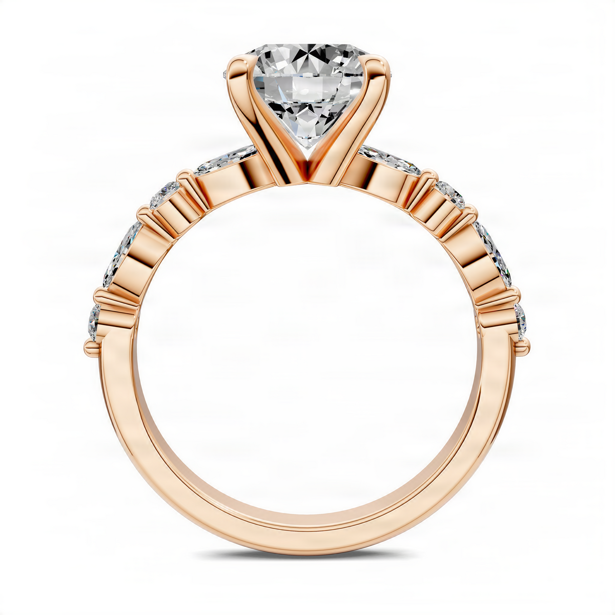 Rose gold prong-set ring with round center stone and small channel-set side stones