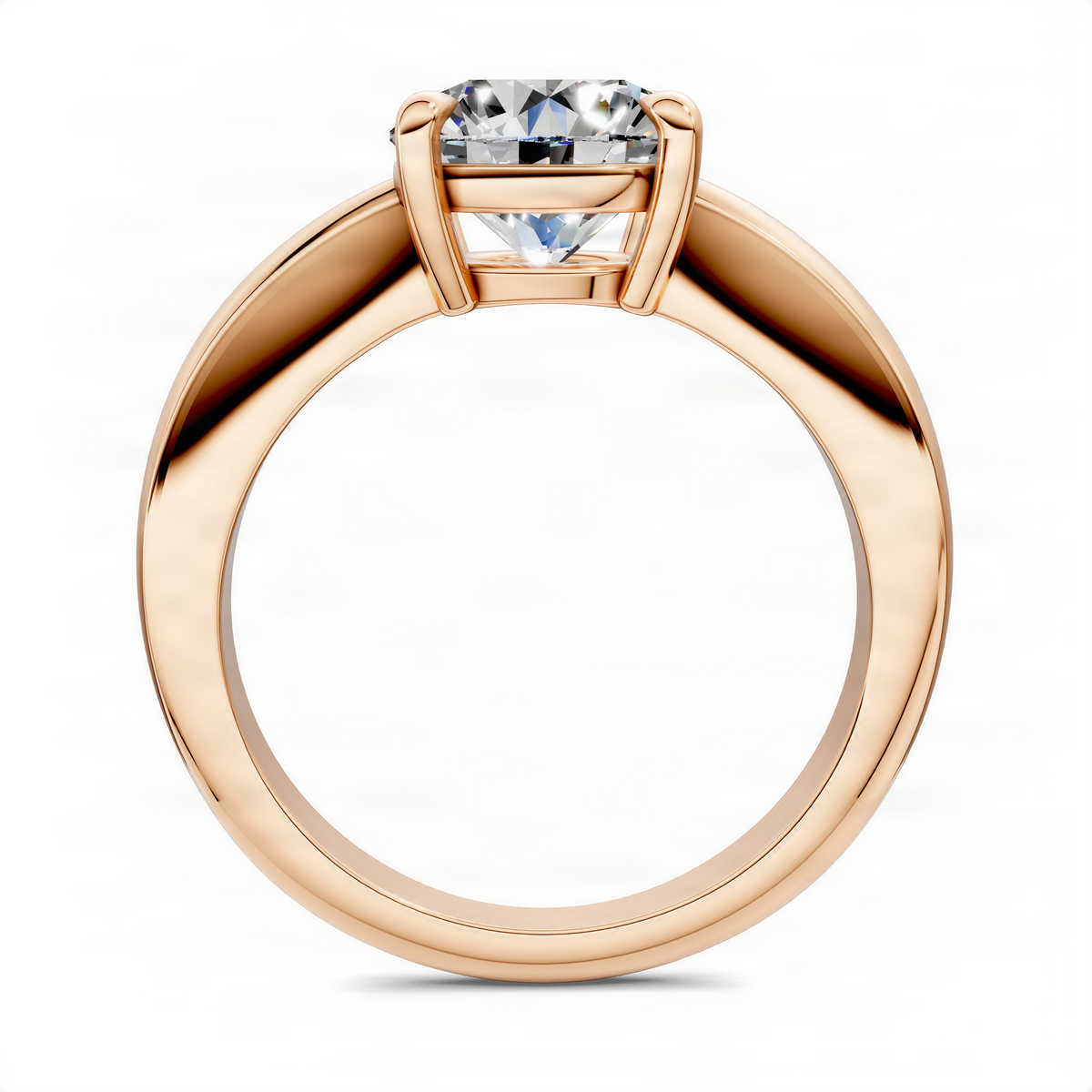 Rose gold round solitaire ring with tapered band and four-prong center stone