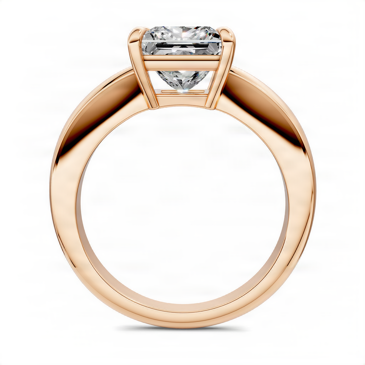 Rose gold tapered solitaire ring with square-cut center stone in four-prong setting