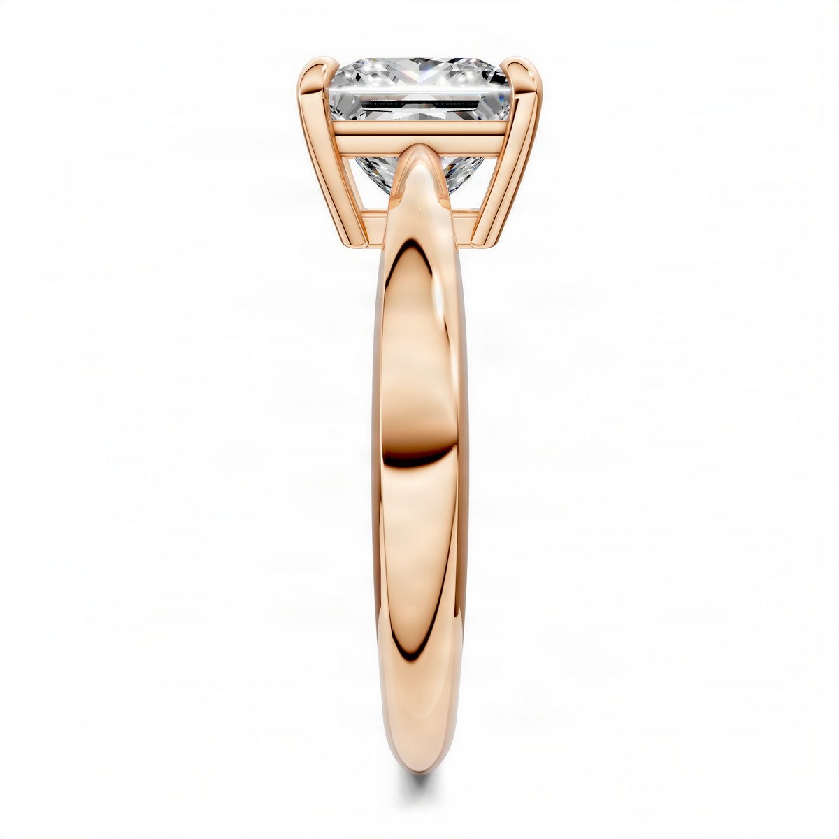 Rose gold tapered solitaire ring with square-cut center stone in four-prong setting
