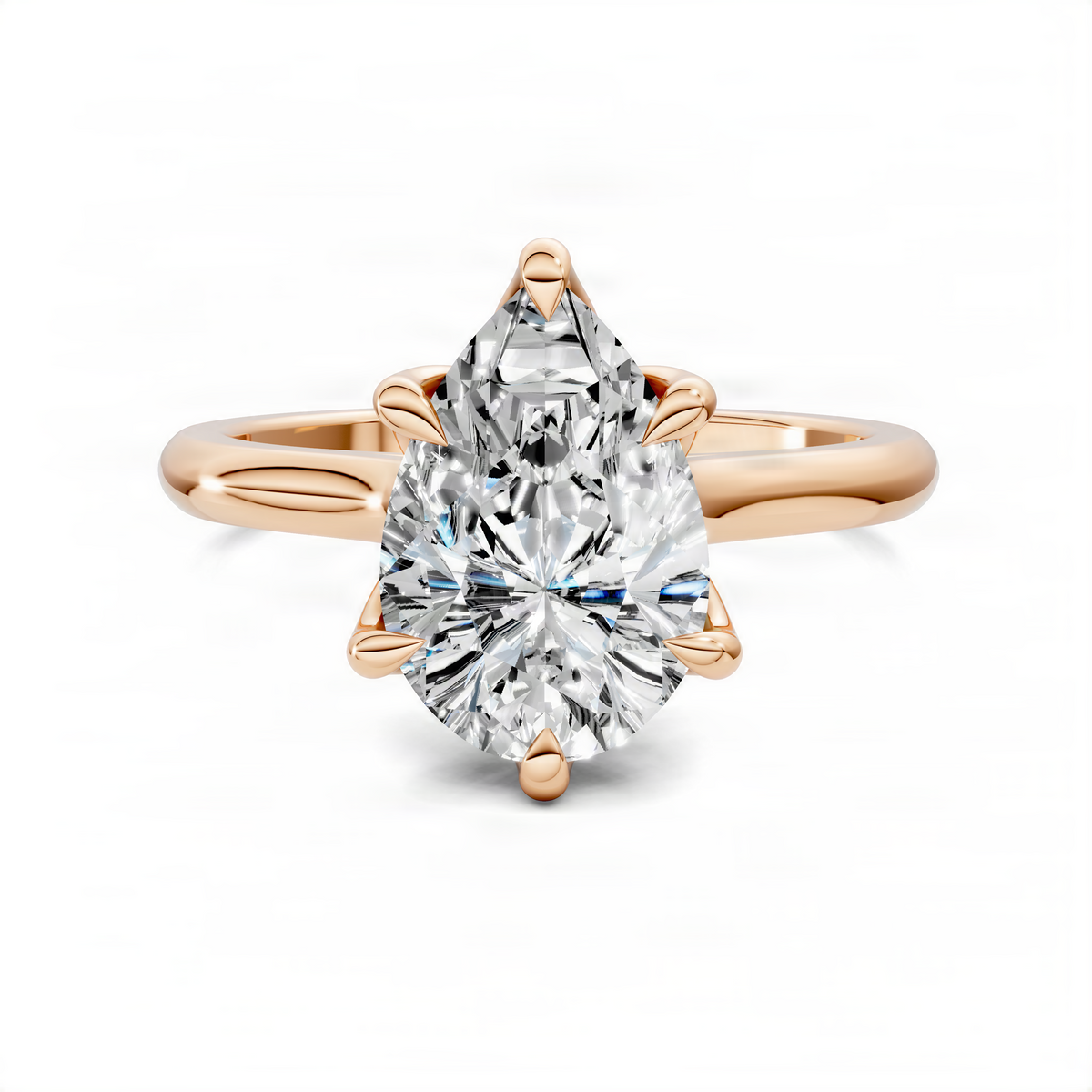 Rose gold pear solitaire engagement ring with prong-set center stone