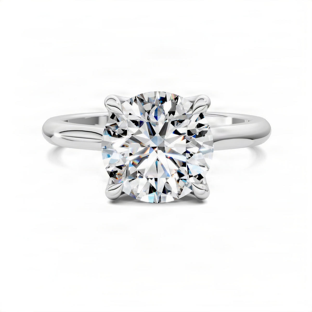Round diamond solitaire ring with sculpted prongs, white gold band