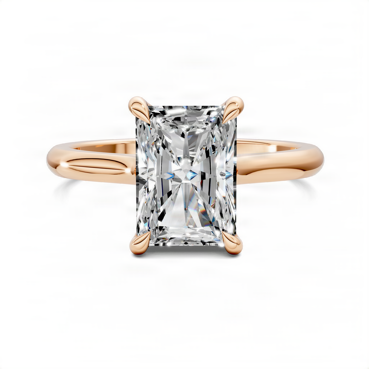 Rose gold solitaire ring with rectangular prong-set center stone