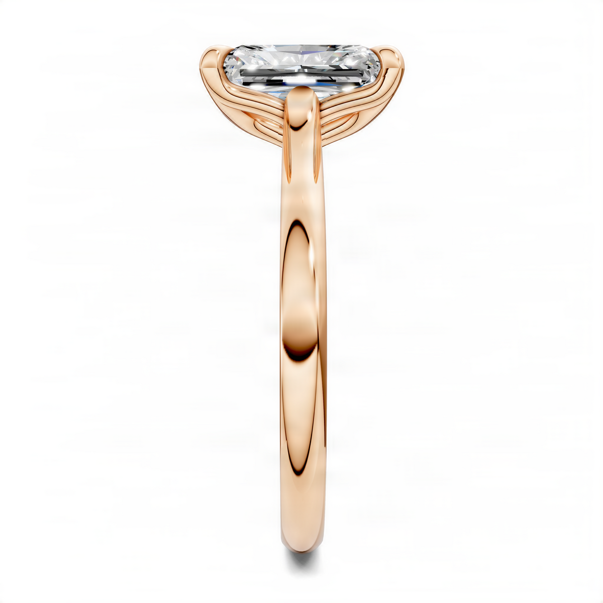 Rose gold solitaire ring with rectangular prong-set center stone