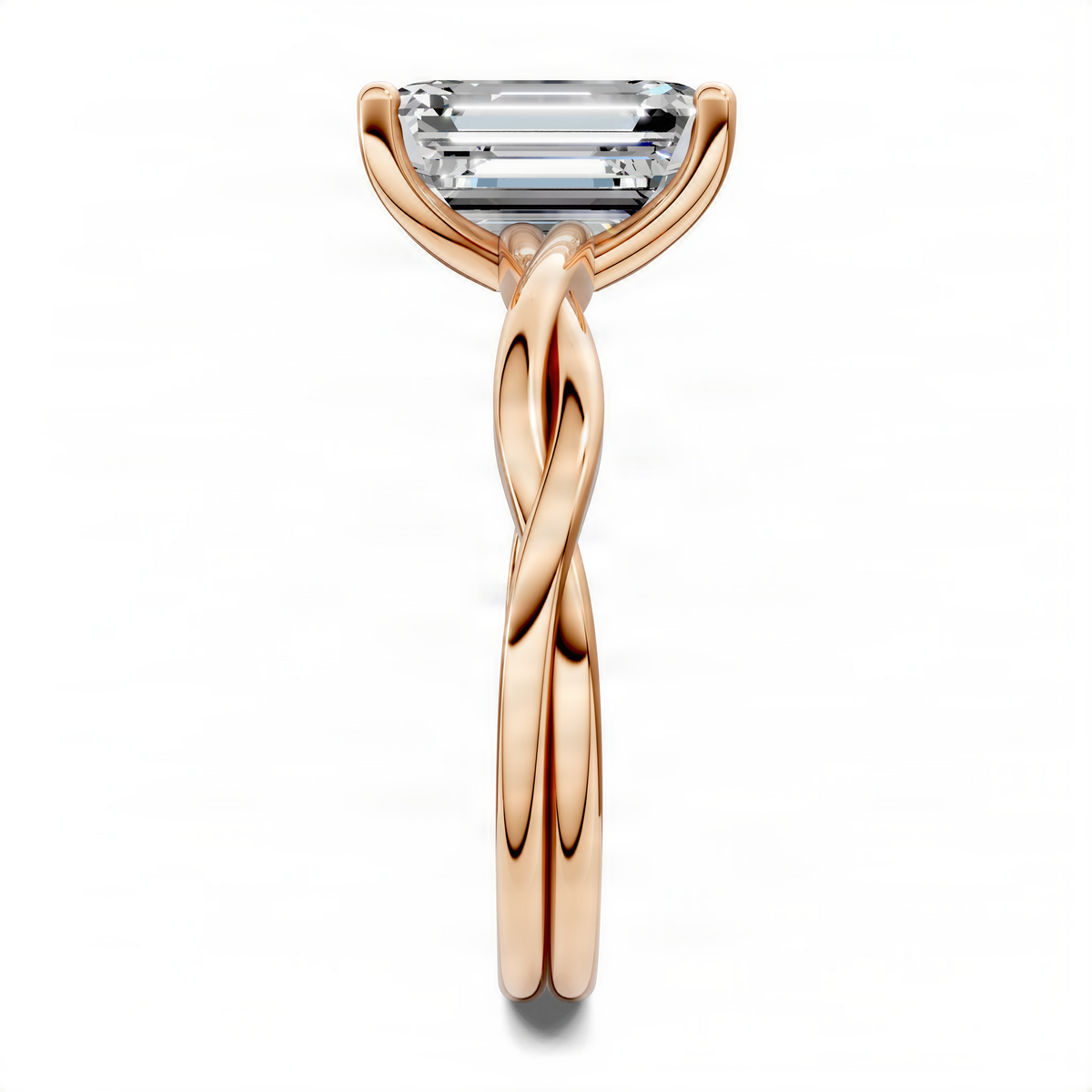 Rose gold solitaire ring with emerald-cut center stone and twisted split band
