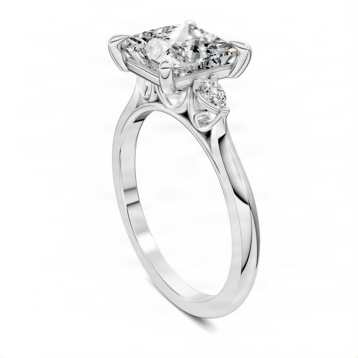 Three-stone ring in white gold with rectangular center stone and round side diamonds