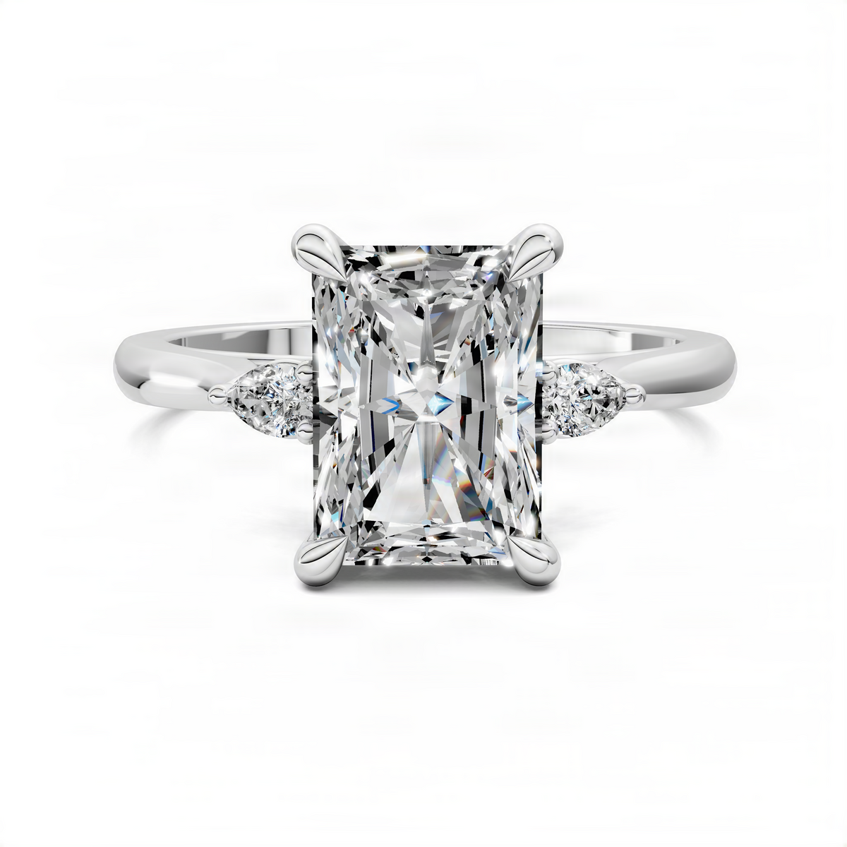 White gold three-stone engagement ring with emerald-cut center and round side stones