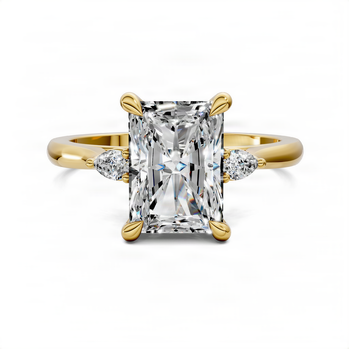 Yellow gold three-stone engagement ring featuring emerald-cut center and round side stones