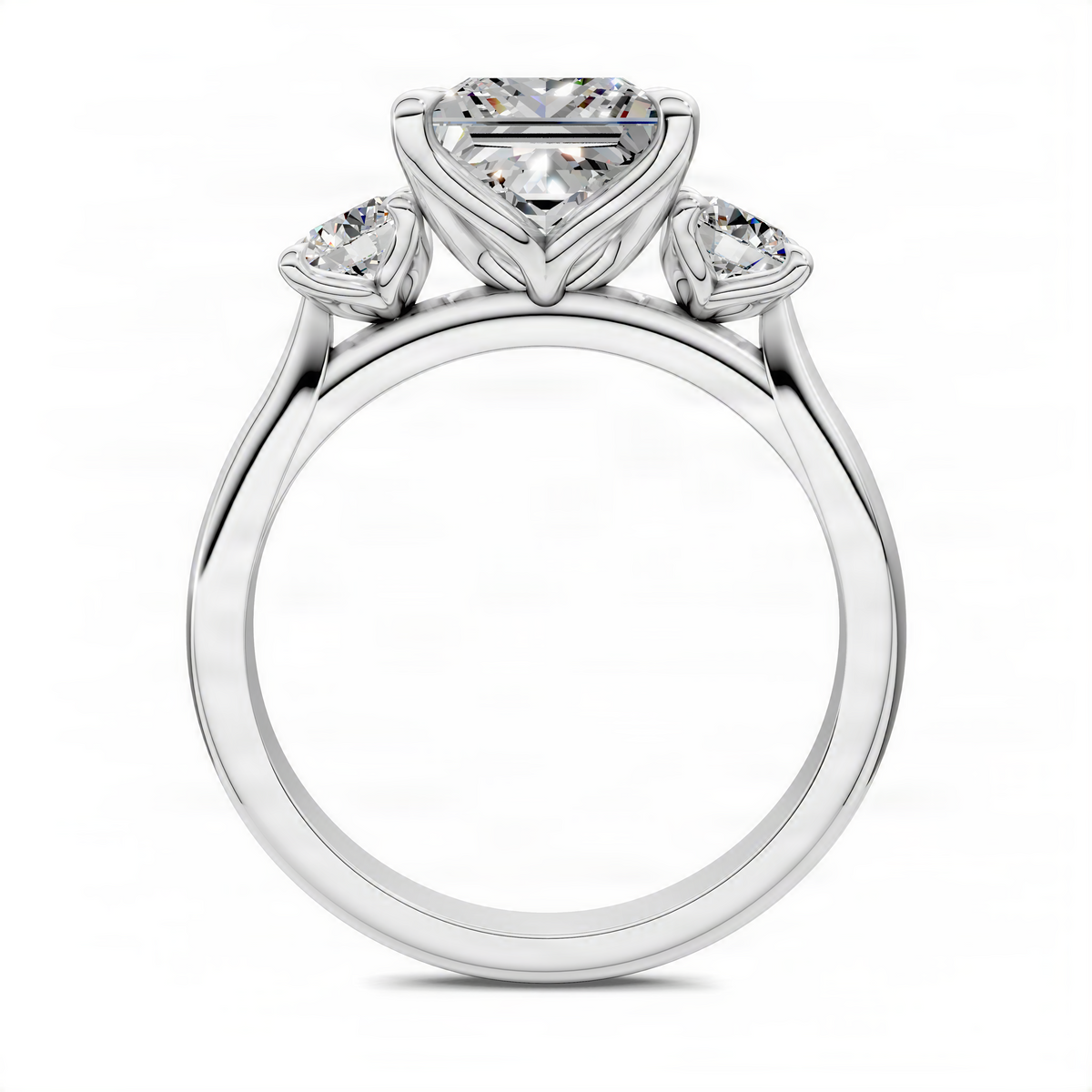 White gold three-stone ring, princess-cut center with two round side stones