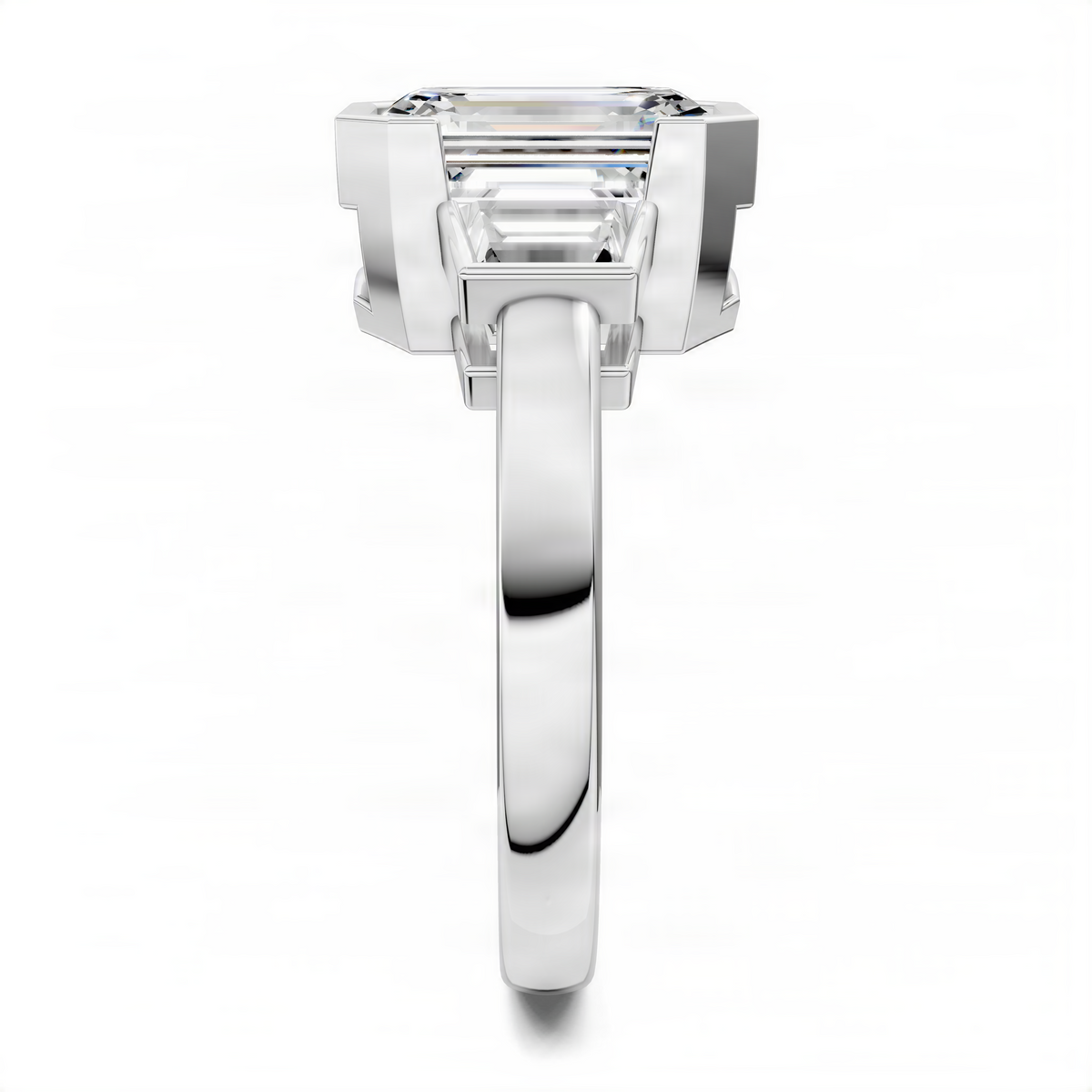 Platinum-toned three-stone emerald-cut ring front view with prong-set center stone