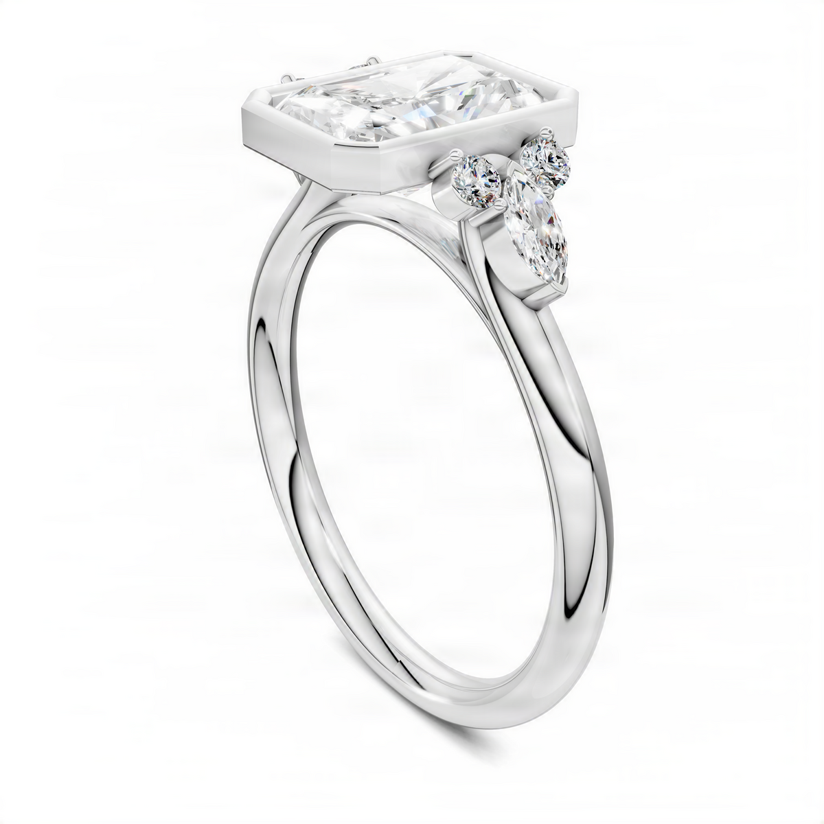 Platinum bezel ring with rectangular center stone and small round side stones.