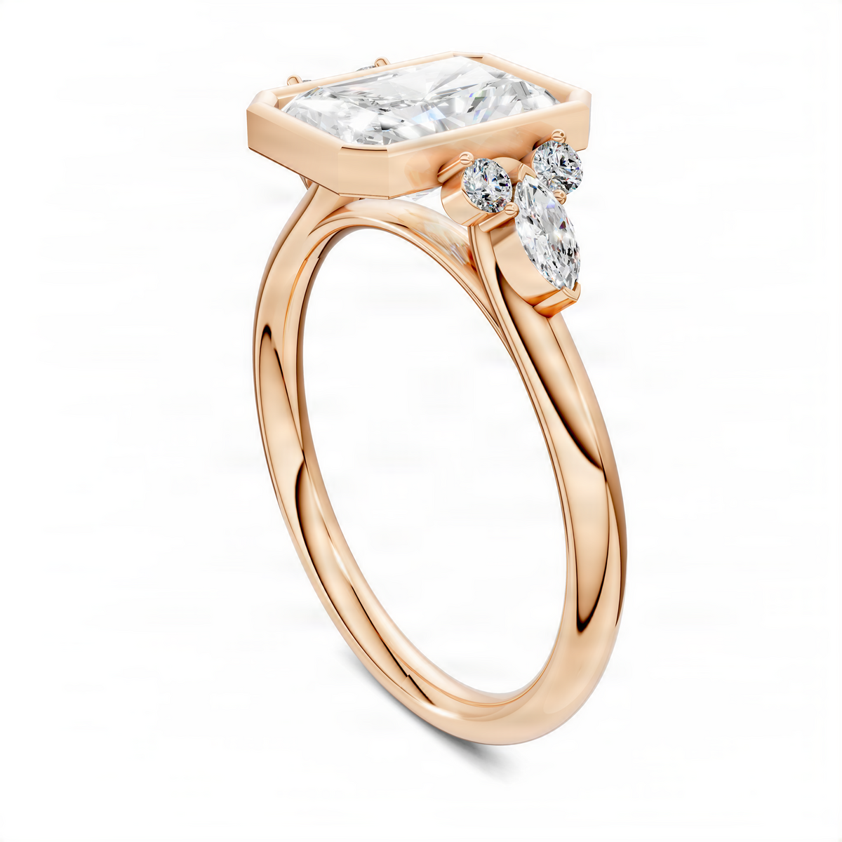 Rose gold bezel ring with rectangular center stone and three round side stones.