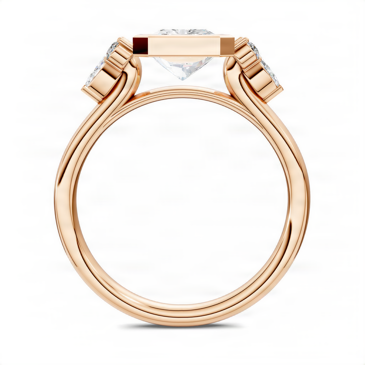 Rose gold bezel ring with rectangular center stone and small round side stones.