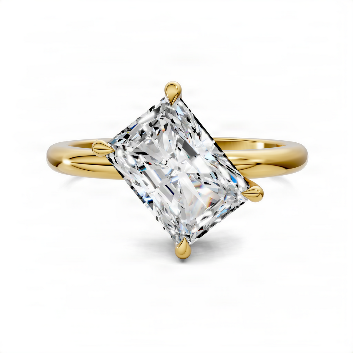 Yellow gold angled solitaire ring with an emerald-cut diamond-style center stone