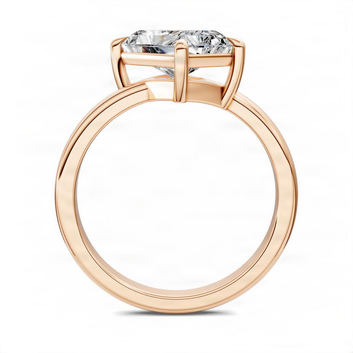 Rose gold angled solitaire ring with emerald-cut diamond-style center stone in setting