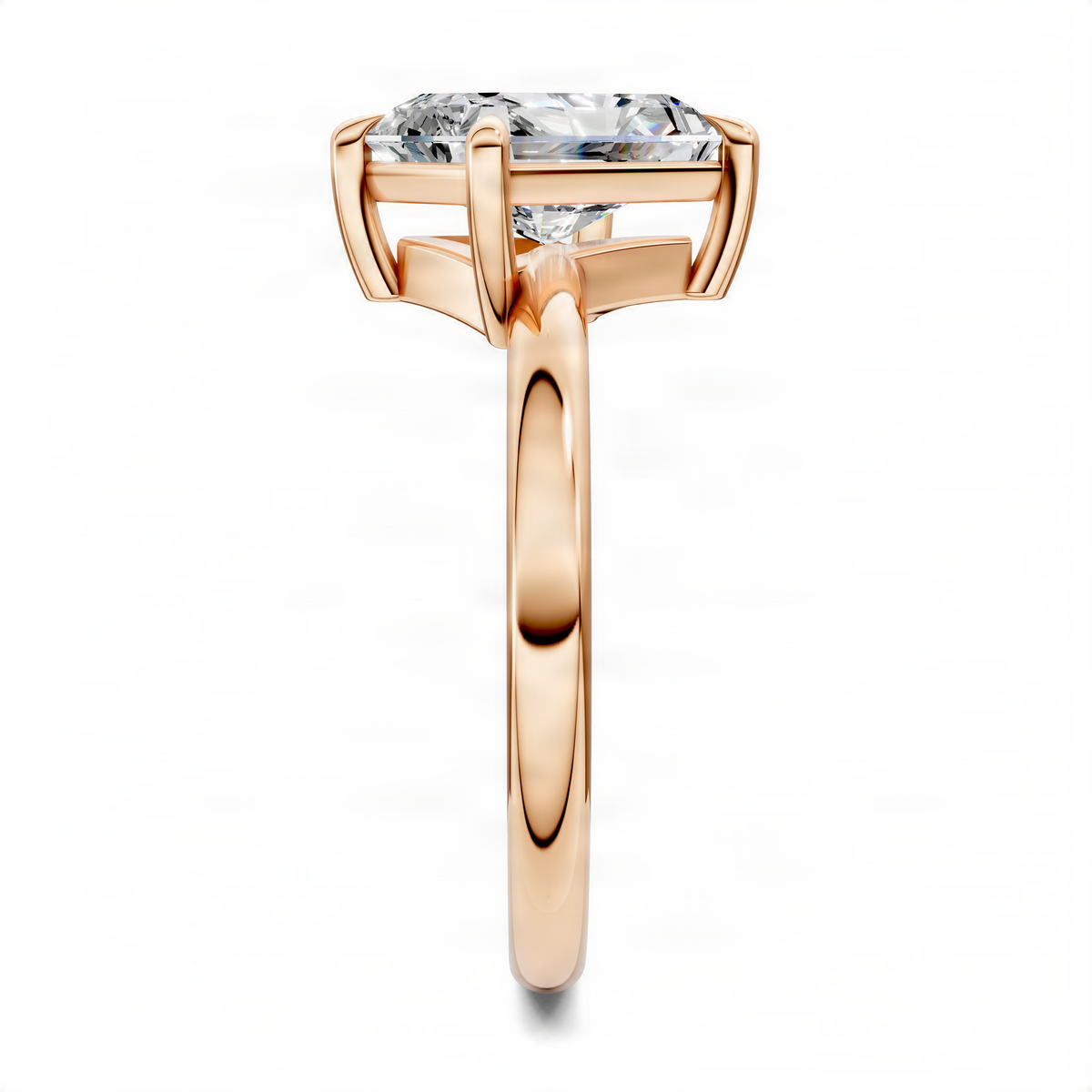 Rose gold angled solitaire ring top view with emerald-cut diamond-style center stone