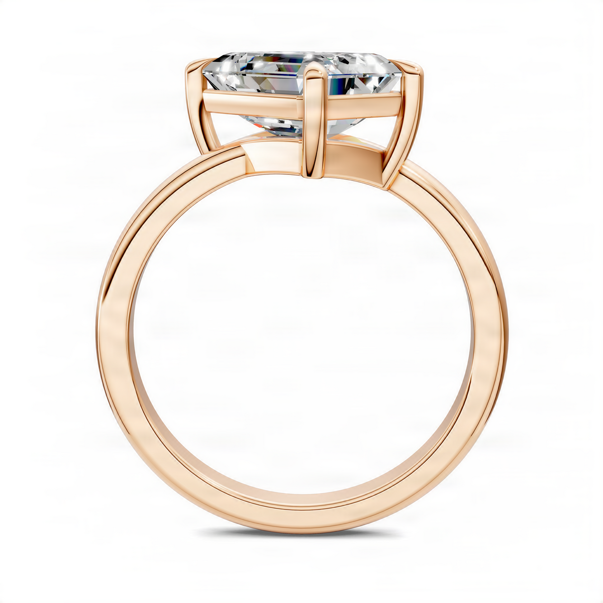 Rose gold angled solitaire ring with emerald-cut center stone, split prong setting