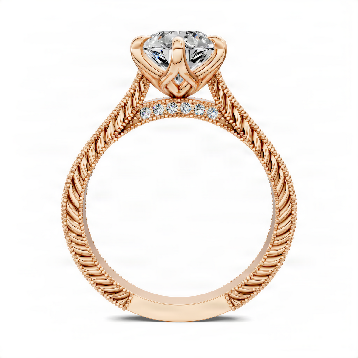 Rose gold vintage vine ring with pear-cut clear center stone and beaded bridge