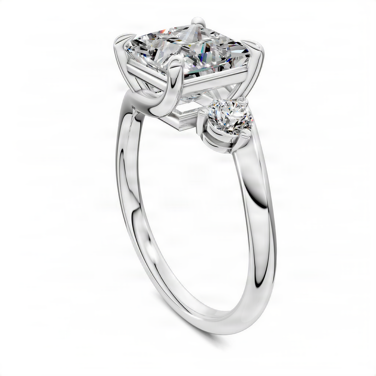 White gold bypass three-stone ring with rectangular center and round side stones