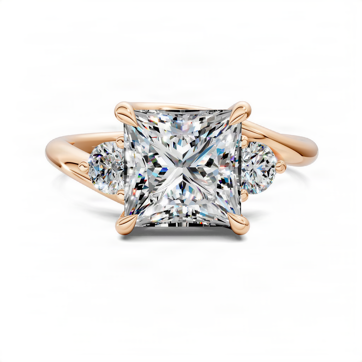 Bypass three-stone ring in rose gold with rectangular center and round side stones