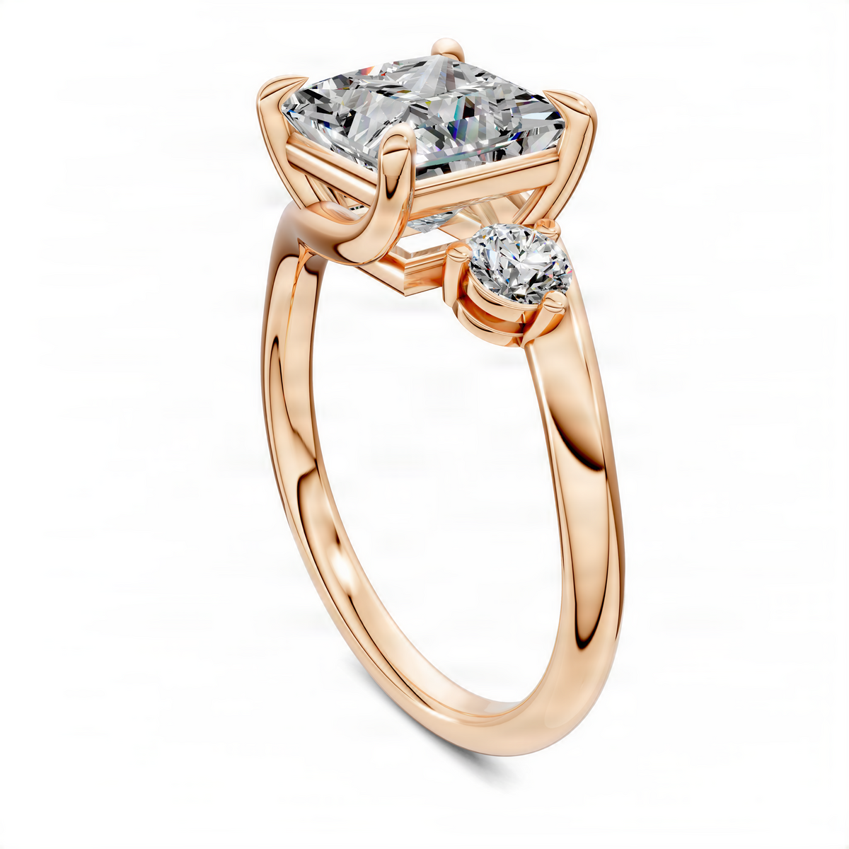 Rose gold bypass three-stone ring with rectangular center and round side stones