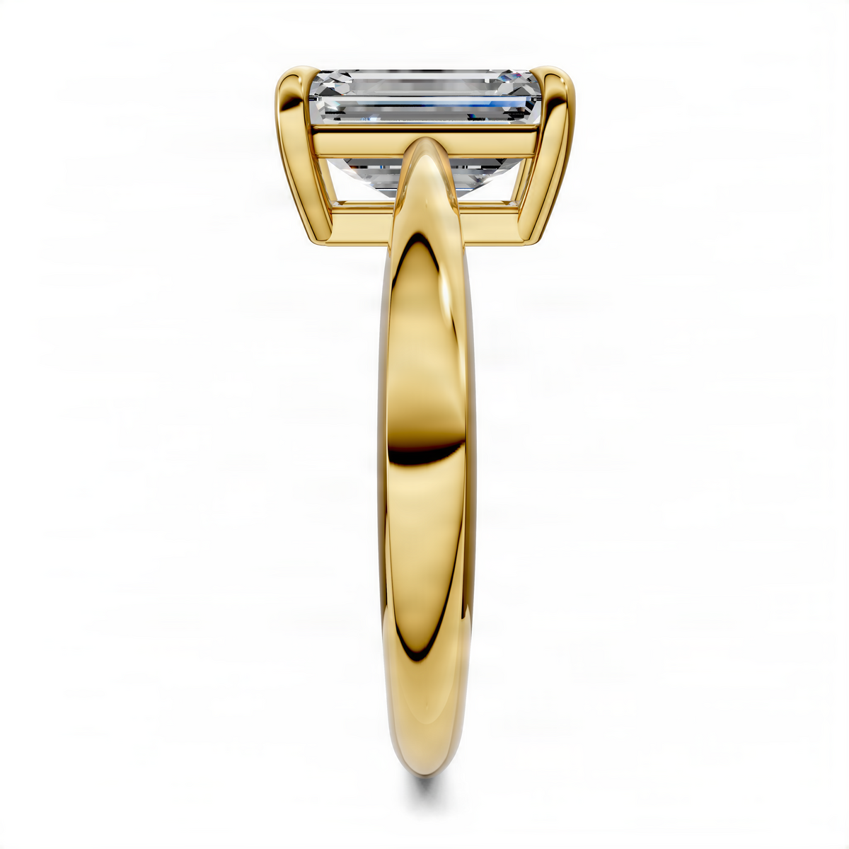 Yellow gold emerald-cut solitaire ring, side profile with tapered shoulders