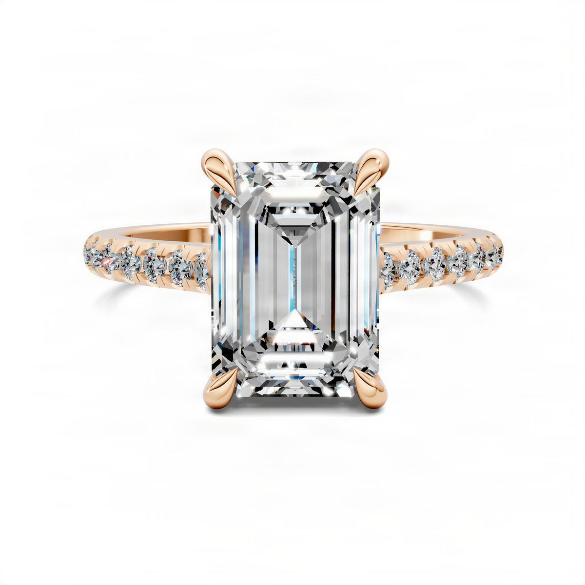 Emerald-cut solitaire ring in yellow gold with pavé band and four prongs