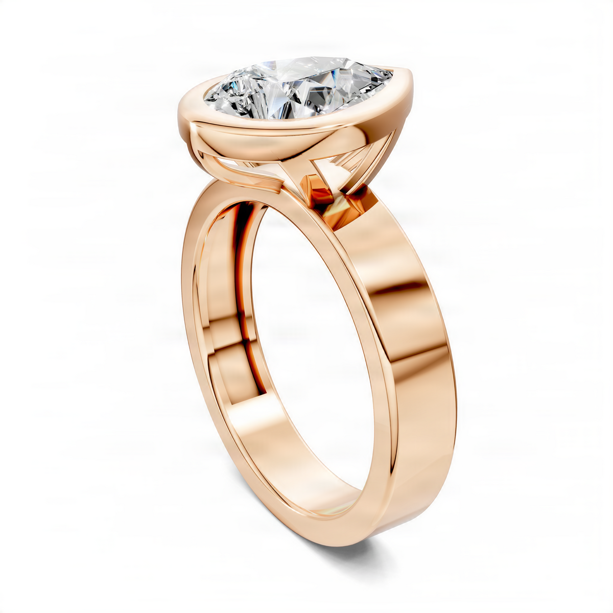 Rose gold solitaire ring with pear-cut diamond bezel-set, angled side view