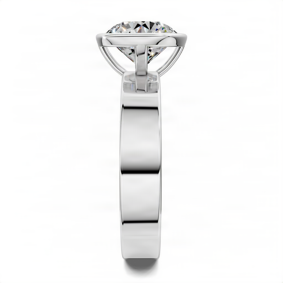 Round bezel solitaire ring with clear center stone, platinum-tone bezel and slim band.