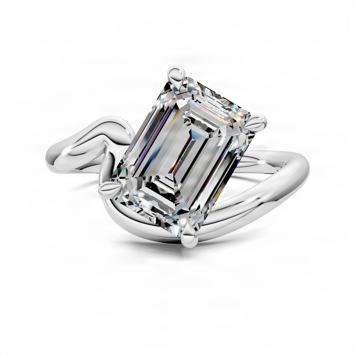 White gold emerald-cut solitaire ring with four-prong setting and sculpted band