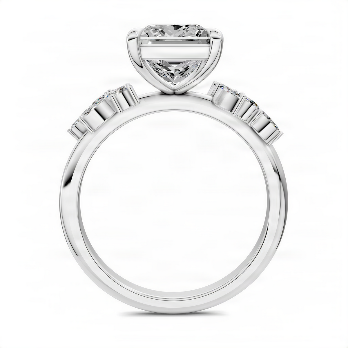 Princess-cut cluster ring in silver metal, prong-set center with band details