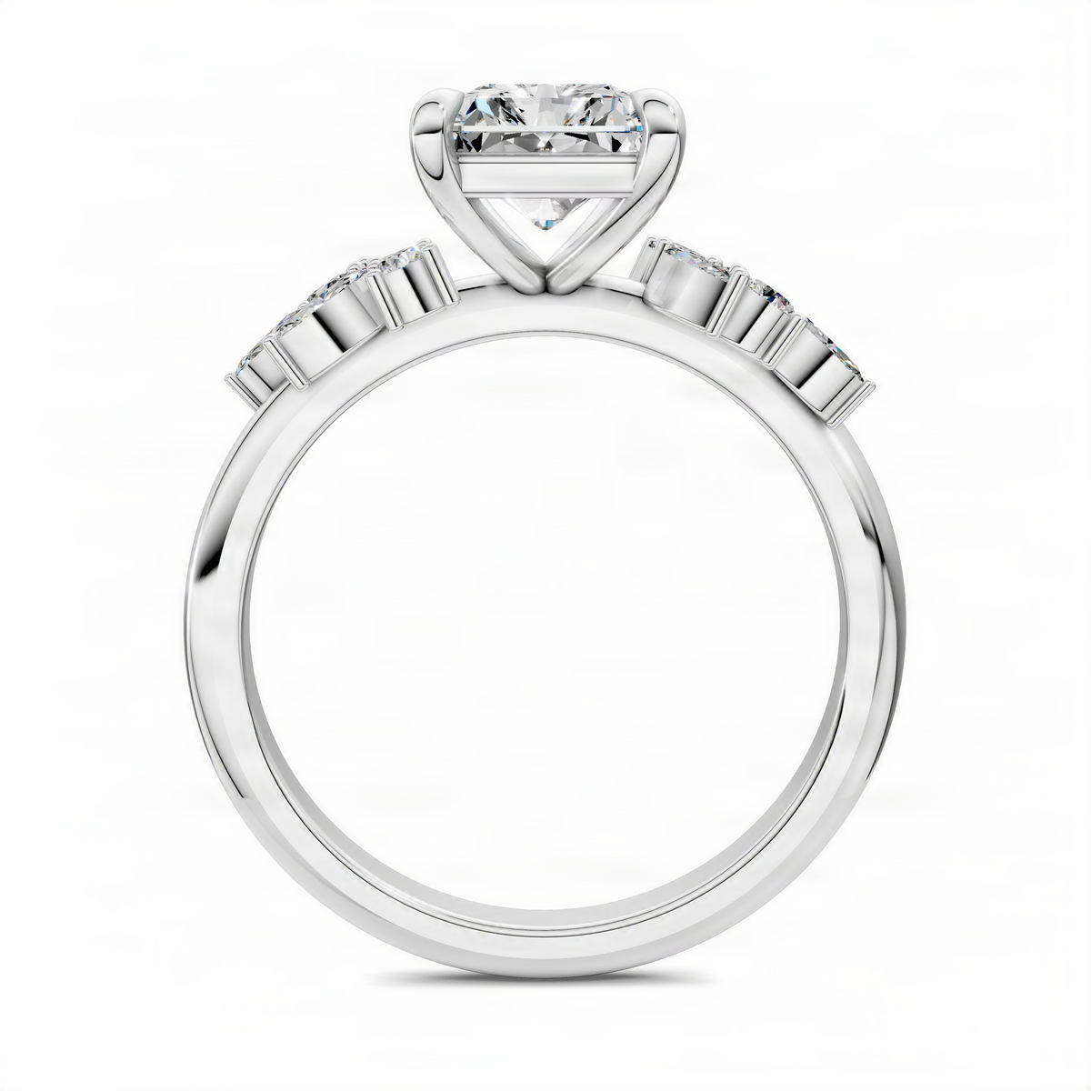 White gold ring with radiant-cut center stone and baguette diamond band