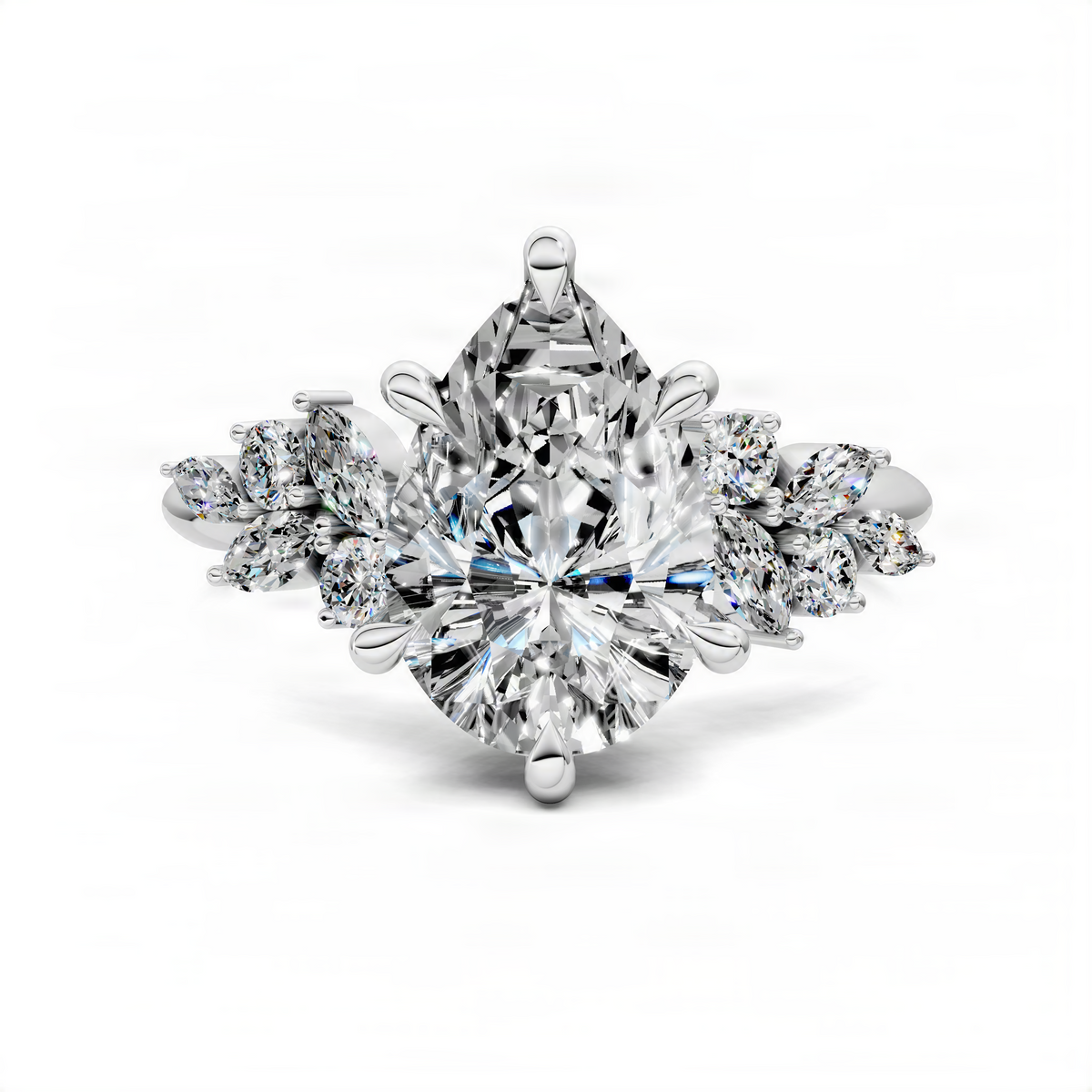 Pear-shaped diamond cluster ring with floral side stones in white metal.